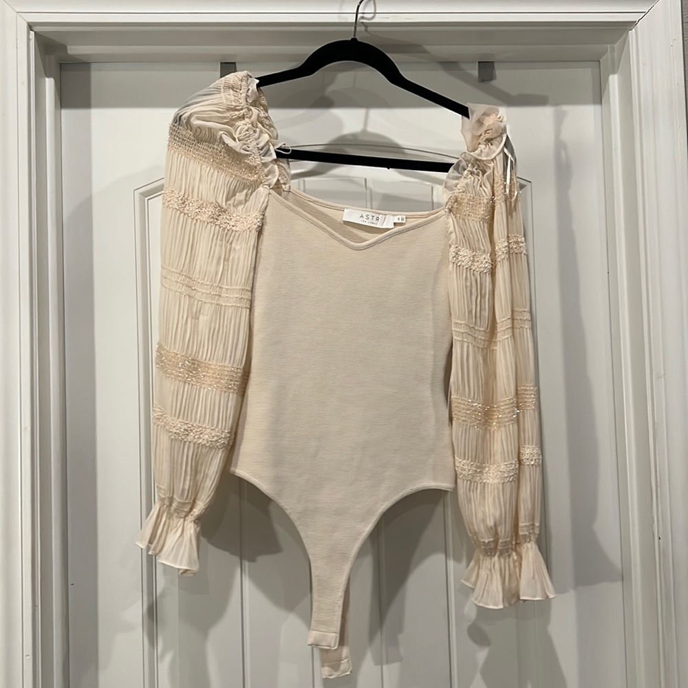 ASTR the label BODYSUIT; cream, size XS; TAGS attached; never been worn